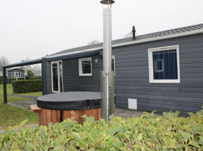 Nice chalet with hot tub in Lathum